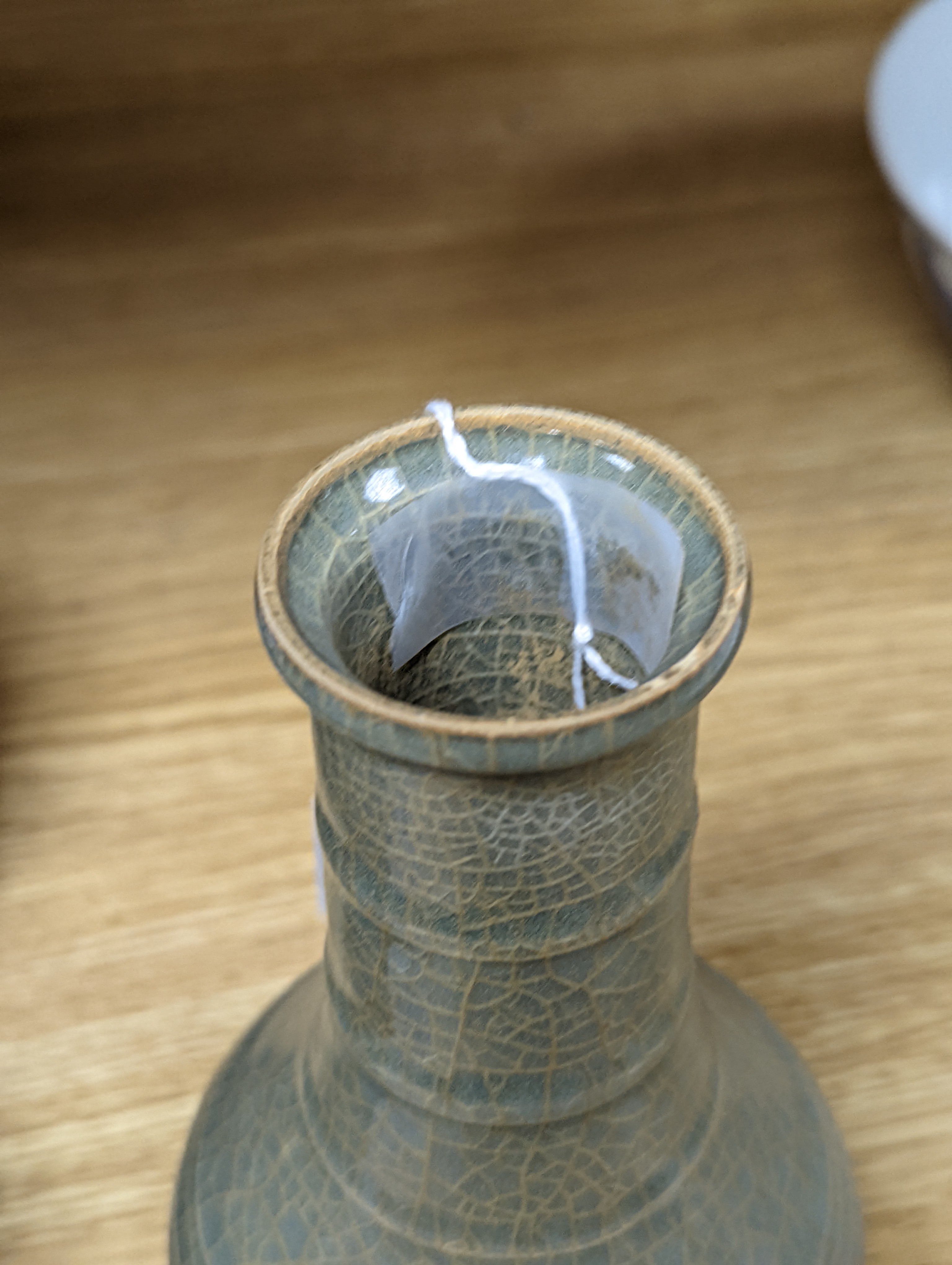 A Chinese celadon bottle vase 15.5cm